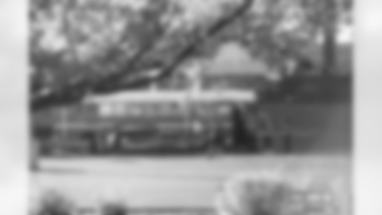 Denver Broncos tailgaters photographed on film during the Broncos' Week 10 game against the Las Vegas Raiders at Empower Field at Mile High in Denver, Colorado on November 7, 2025. Photo by Ben Swanson / Denver Broncos