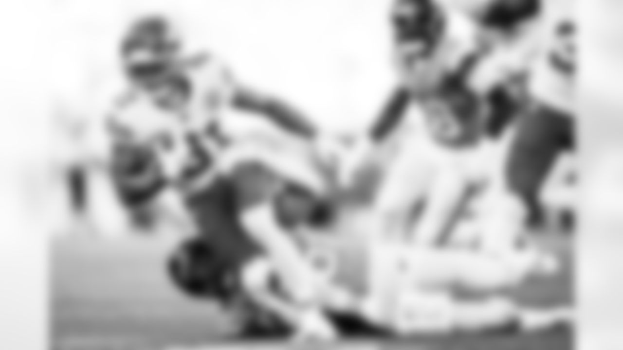 Denver Broncos fullback Adam Prentice (46) tackles Kansas City Chiefs wide receiver Nikko Remigio (81) during the Broncos' Week 11 game against the Kansas City Chiefs at Empower Field at Mile High in Denver, Colorado on November 16, 2025. Photo by Gavin Liddell / Denver Broncos