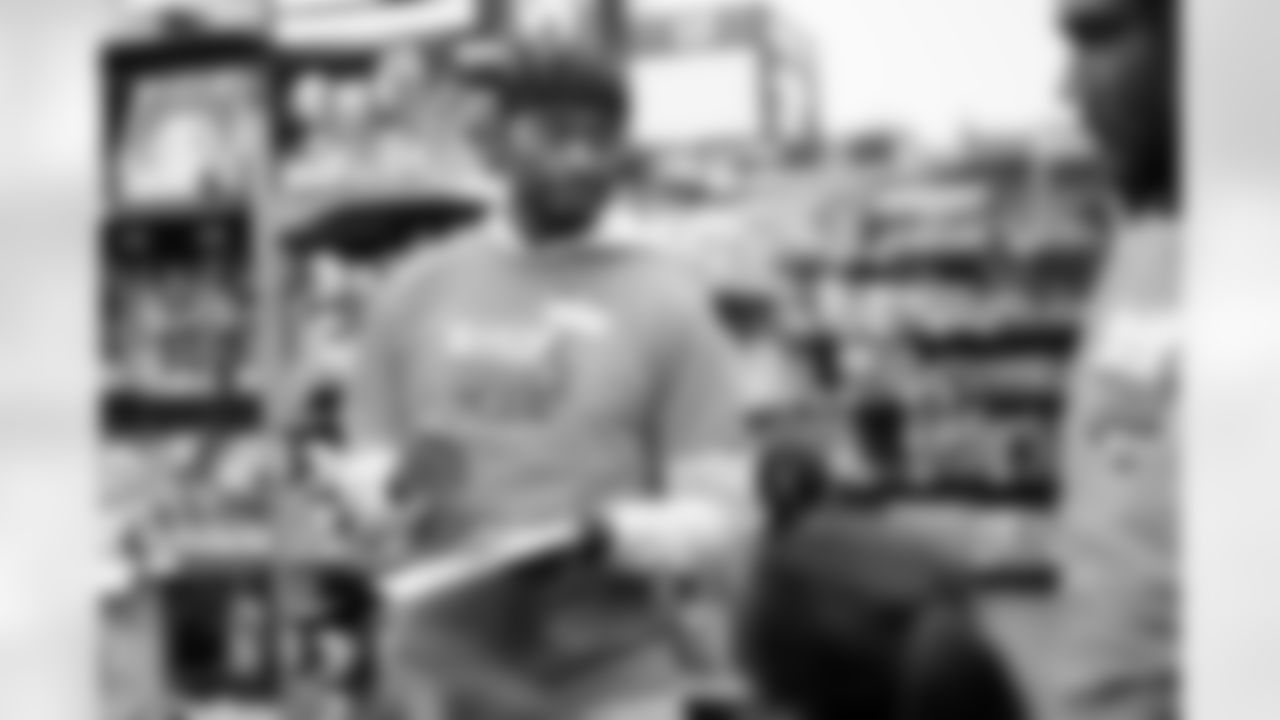 Children from the Denver Broncos Boys & Girls Club participate in a Shop with a Jock shopping spree with Broncos players, alumni and cheerleader alumni in Aurora, Colorado on December 2, 2025. Photo by Ben Swanson / Denver Broncos