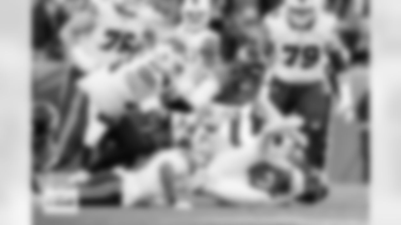 Denver Broncos safety Talanoa Hufanga (9) recovers a fumble during the Broncos' Divisional Round playoff game against the Buffalo Bills at Empower Field at Mile High in Denver, Colorado on January 17, 2026. Photo by Gabriel Christus / Denver Broncos