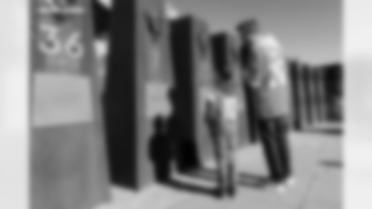 Denver Broncos fans admire the Ring of Fame pillars before the Broncos' Divisional Round playoff game against the Buffalo Bills at Empower Field at Mile High in Denver, Colorado on January 17, 2026. Photo by Gavin Liddell / Denver Broncos