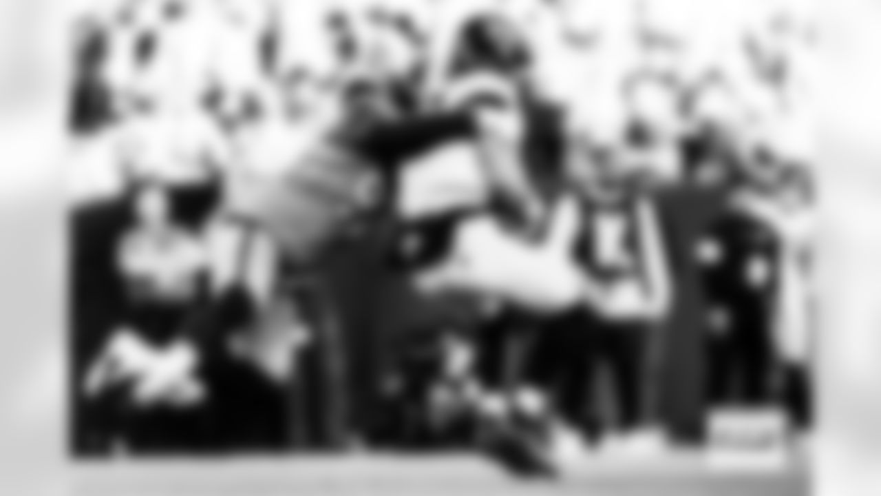 Denver Broncos defensive tackle Malcolm Roach (97) sacks Jacksonville Jaguars quarterback Trevor Lawrence (16) during the Broncos' Week 16 game against the Jacksonville Jaguars at Empower Field at Mile High in Denver, Colorado on December 21, 2025. Photo by Ben Swanson / Denver Broncos