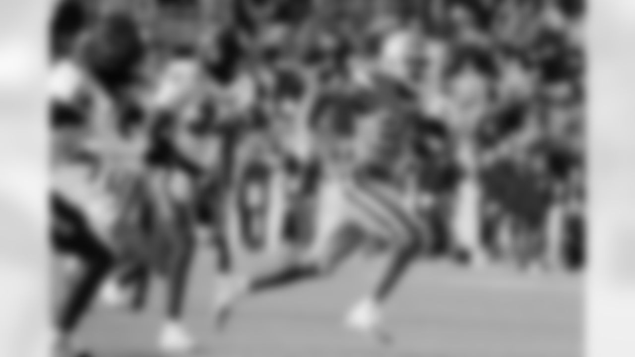 Sample mock draft analysis: "With his blend of patience, power and speed, the former Tar Heels back would help elevate Sean Payton's offense." [Dane Brugler, The Athletic, April 16] (AP Photo/Chris Seward)