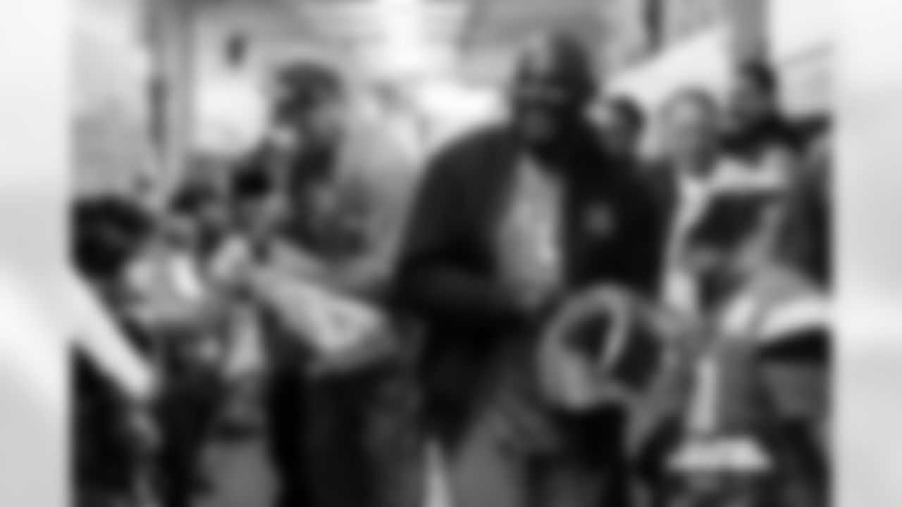 Students cheer on the Broncos during a school hallway parade to celebrate the Denver Broncos making the playoffs at Doull Elementary School in Denver, Colorado on January 16, 2026. Photo by Ben Swanson / Denver Broncos