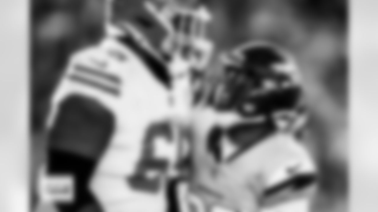 Denver Broncos cornerback Ja'Quan McMillian (29) has words with Kansas City Chiefs guard Trey Smith (65) during the Broncos' Week 11 game against the Kansas City Chiefs at Empower Field at Mile High in Denver, Colorado on November 16, 2025. Photo by Ben Swanson / Denver Broncos