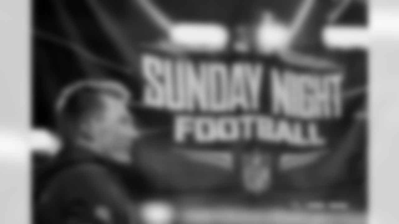 A double-exposure image of Bo Nix and "Sunday Night Football" signage before the Broncos' Week 13 game against the Washington Commanders at Northwest Stadium in Landover, Maryland on November 30, 2025. Photo by Gabriel Christus / Denver Broncos
