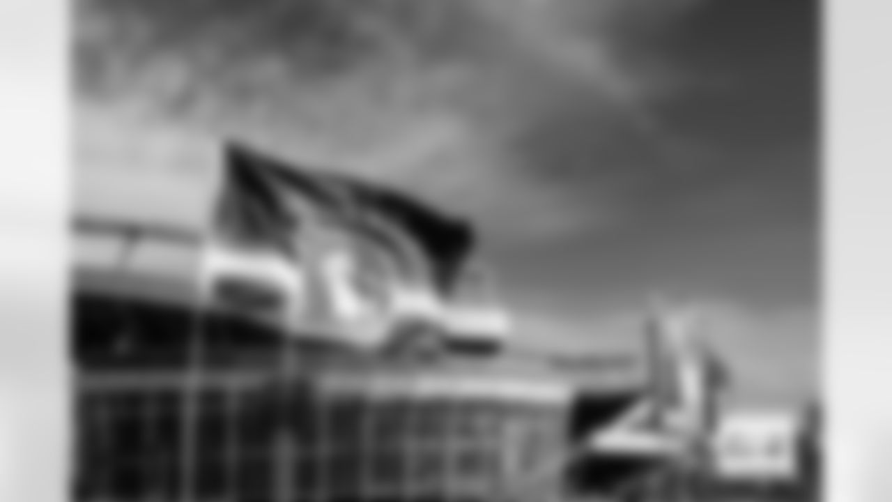 A flag with the throwback logo waves in front of the stadium before the Broncos' Week 18 game against the Los Angeles Chargers at Empower Field at Mile High in Denver, Colorado on January 4, 2026. Photo by Ben Swanson / Denver Broncos