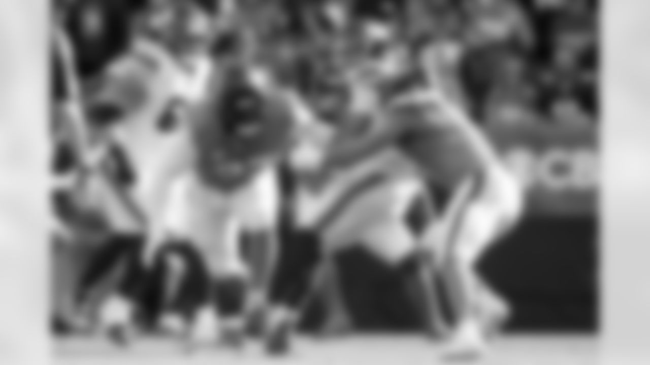 Denver Broncos linebacker Jonathon Cooper (0) sacks New York Giants quarterback Jaxson Dart (6) during the Broncos' Week 7 game against the New York Giants at Empower Field at Mile High in Denver, Colorado on October 19, 2025. Photo by Gabriel Christus / Denver Broncos