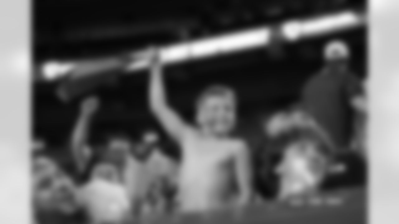 A young fan cheers during the Broncos' preseason Week 2 game against the Green Bay Packers at Empower Field at Mile High in Denver, Colorado on August 18, 2024. (Photo by Ben Swanson/Denver Broncos)