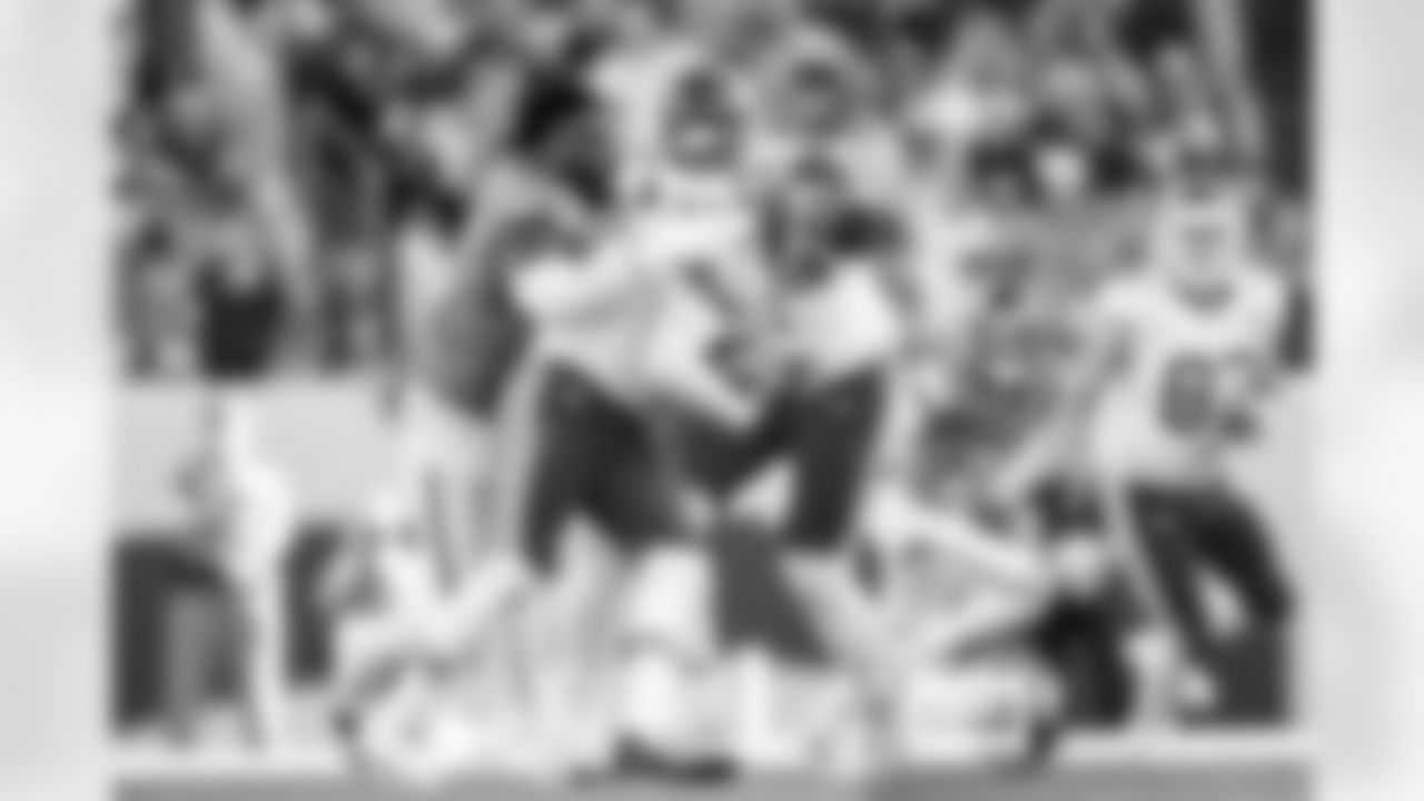 Denver Broncos defensive tackle Malcolm Roach (97) pressures Kansas City Chiefs quarterback Patrick Mahomes (15) after his helmet was knocked off during the Broncos' Week 11 game against the Kansas City Chiefs at Empower Field at Mile High in Denver, Colorado on November 16, 2025. Photo by Gabriel Christus / Denver Broncos