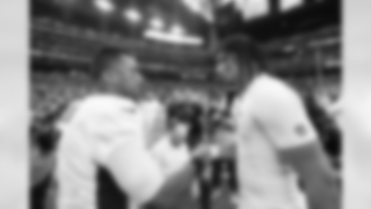 Russell Wilson and CJ Stroud after the Broncos' Week 13 game against the Houston Texans at NRG Stadium in Houston, Texas on December 3, 2023. Photo by Gabriel Christus / Denver Broncos