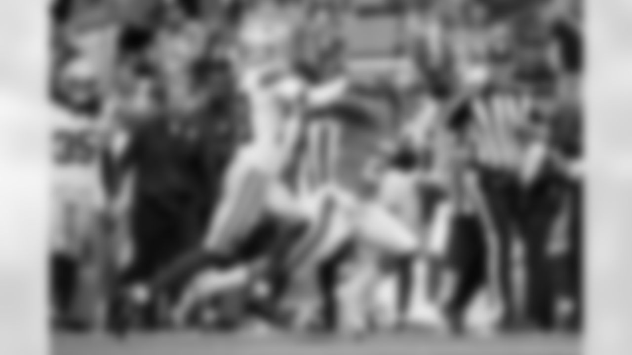 Denver Broncos running back J.K. Dobbins (27) stiff-arms Dallas Cowboys safety Alijah Clark (38) during the Broncos' Week 8 game against the Dallas Cowboys at Empower Field at Mile High in Denver, Colorado on October 26, 2025. Photo by Gabriel Christus / Denver Broncos