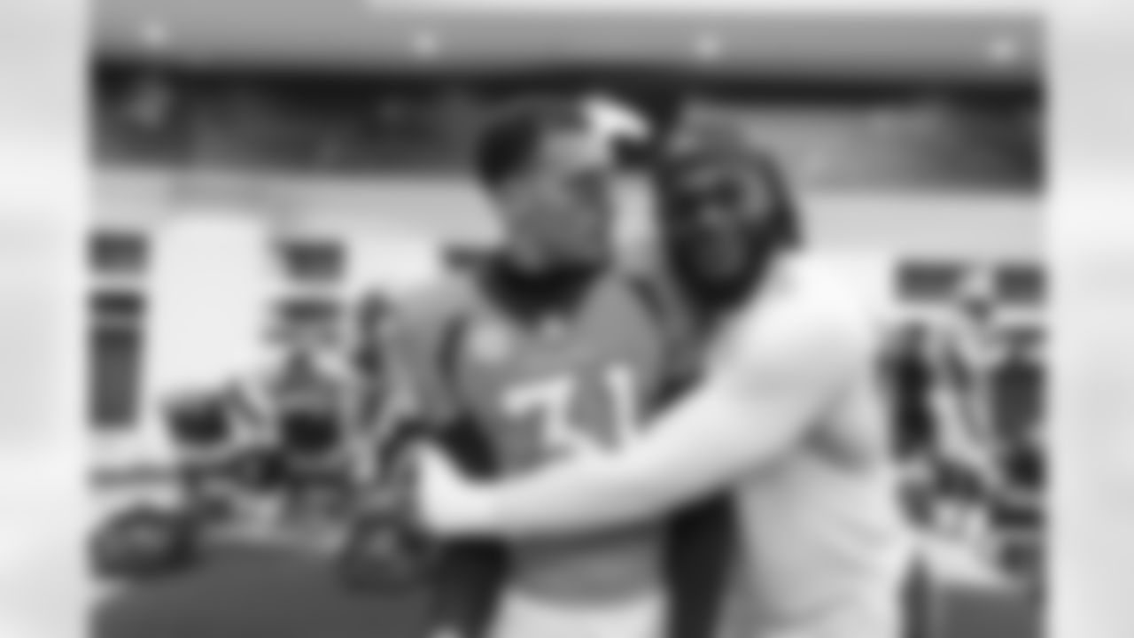 Justin Simmons and Christopher Allen celebrate in the locker room after an NFL game against the Los Angeles Chargers on Sunday, January 8, 2023 at Empower Field at Mile High in Denver, Colorado.
Photo by Gabriel Christus / Denver Broncos