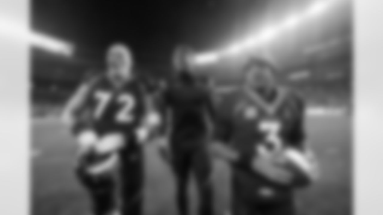 Denver Broncos offensive tackle Garett Bolles (72), wide receiver Courtland Sutton (14) and quarterback Russell Wilson (3) during the Broncos' Week 11 game against the Minnesota Vikings at Empower Field at Mile High in Denver, Colorado on November 19, 2023. Photo by Ben Swanson / Denver Broncos