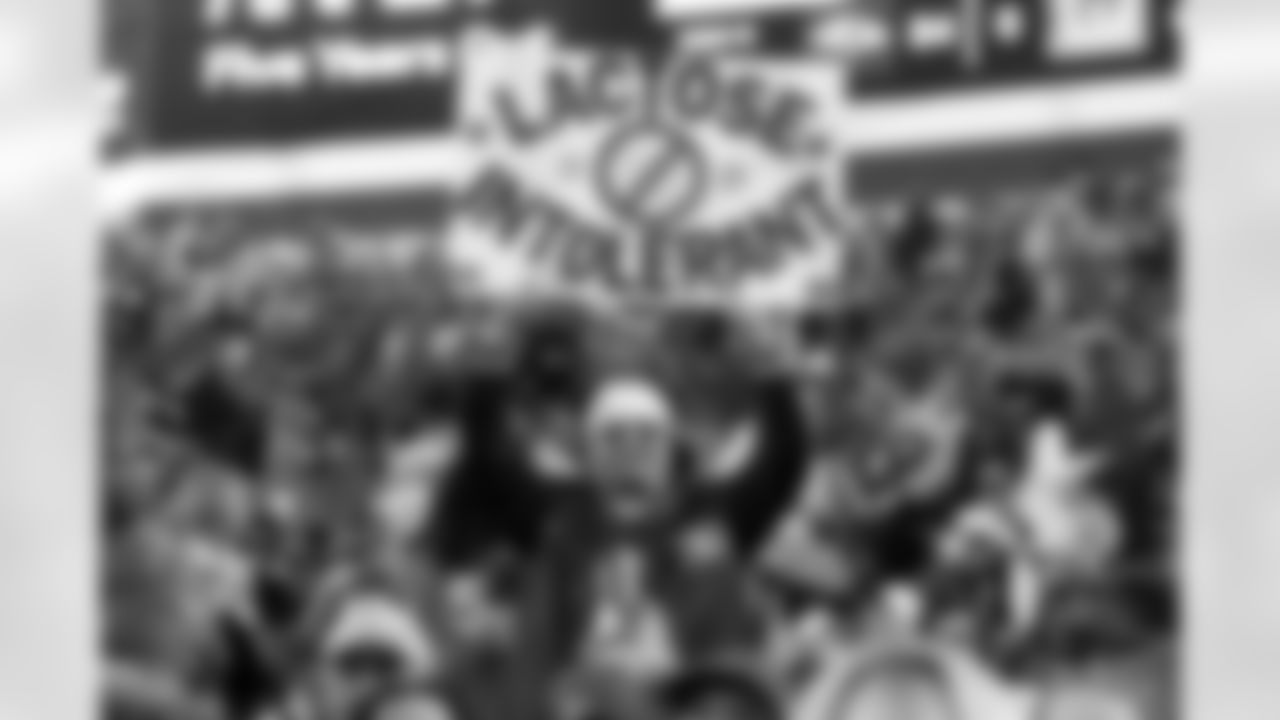 A fan holds up a "Lactose Intolerant" sign before the Broncos' Week 15 game against the Green Bay Packers at Empower Field at Mile High in Denver, Colorado on December 14, 2025. Photo by Gavin Liddell / Denver Broncos