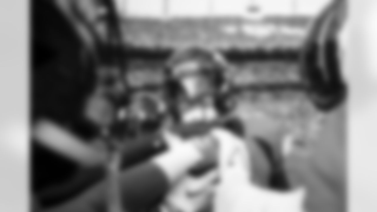 Denver Broncos safety Justin Simmons (31) gives a pregame speech in the defensive backs huddle before the Broncos' Week 17 game against the Los Angeles Chargers at Empower Field at Mile High in Denver, Colorado on December 31, 2023. Photo by Ben Swanson / Denver Broncos
