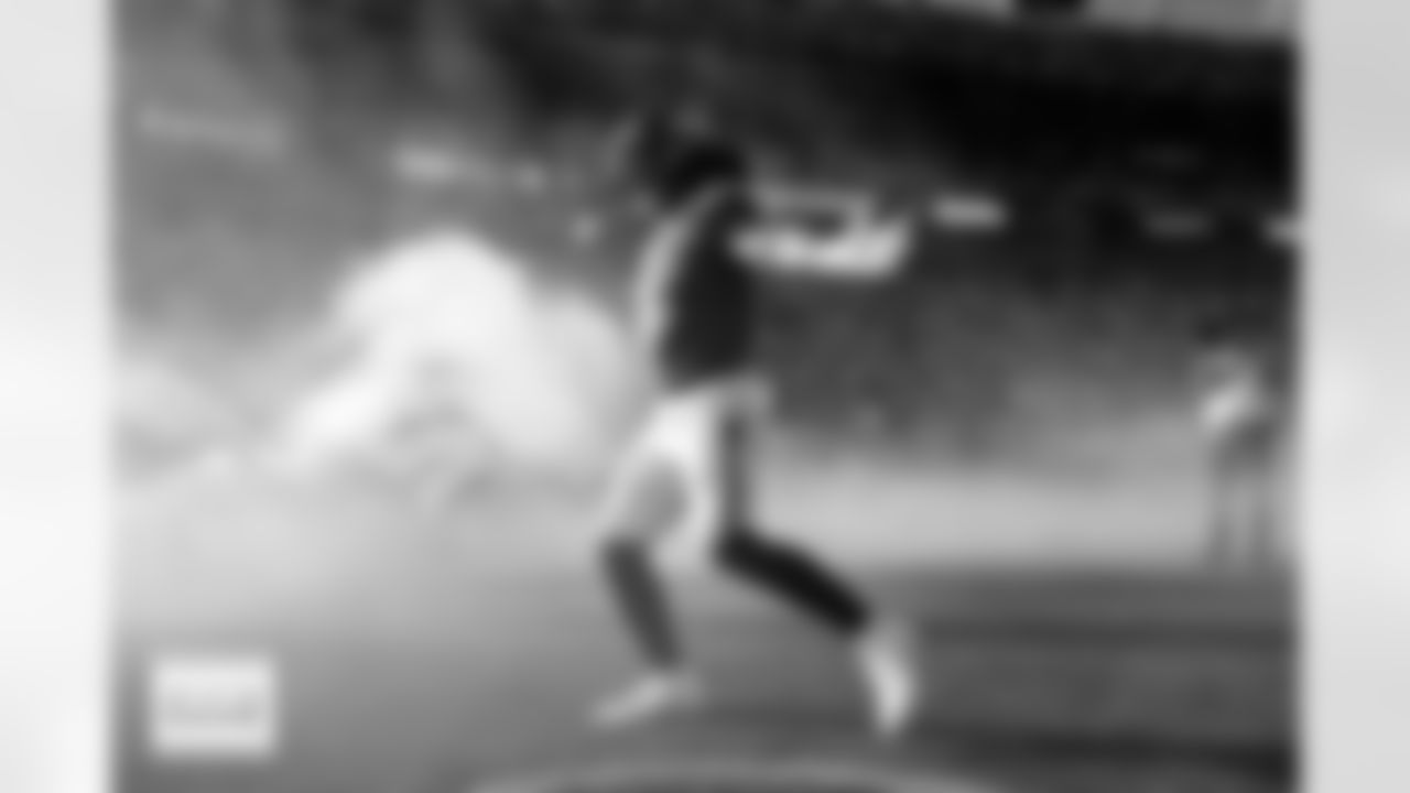 runs out of the tunnel for player introductions before the Broncos' Week 15 game against the Green Bay Packers at Empower Field at Mile High in Denver, Colorado on December 14, 2025. Photo by Gabriel Christus / Denver Broncos