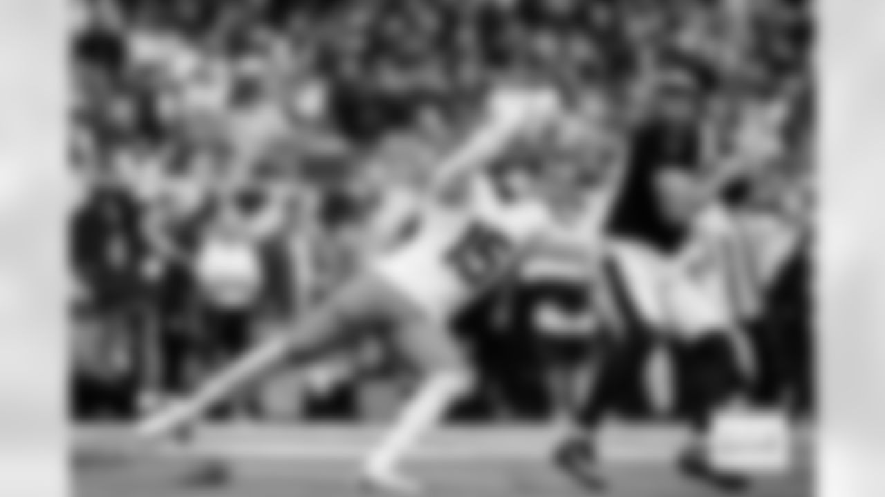 Denver Broncos linebacker Nik Bonitto (15) pressures Houston Texans quarterback Davis Mills (10) during the Broncos' Week 9 game against the Houston Texans at NRG Stadium in Houston, Texas on November 2, 2025. Photo by Ben Swanson / Denver Broncos