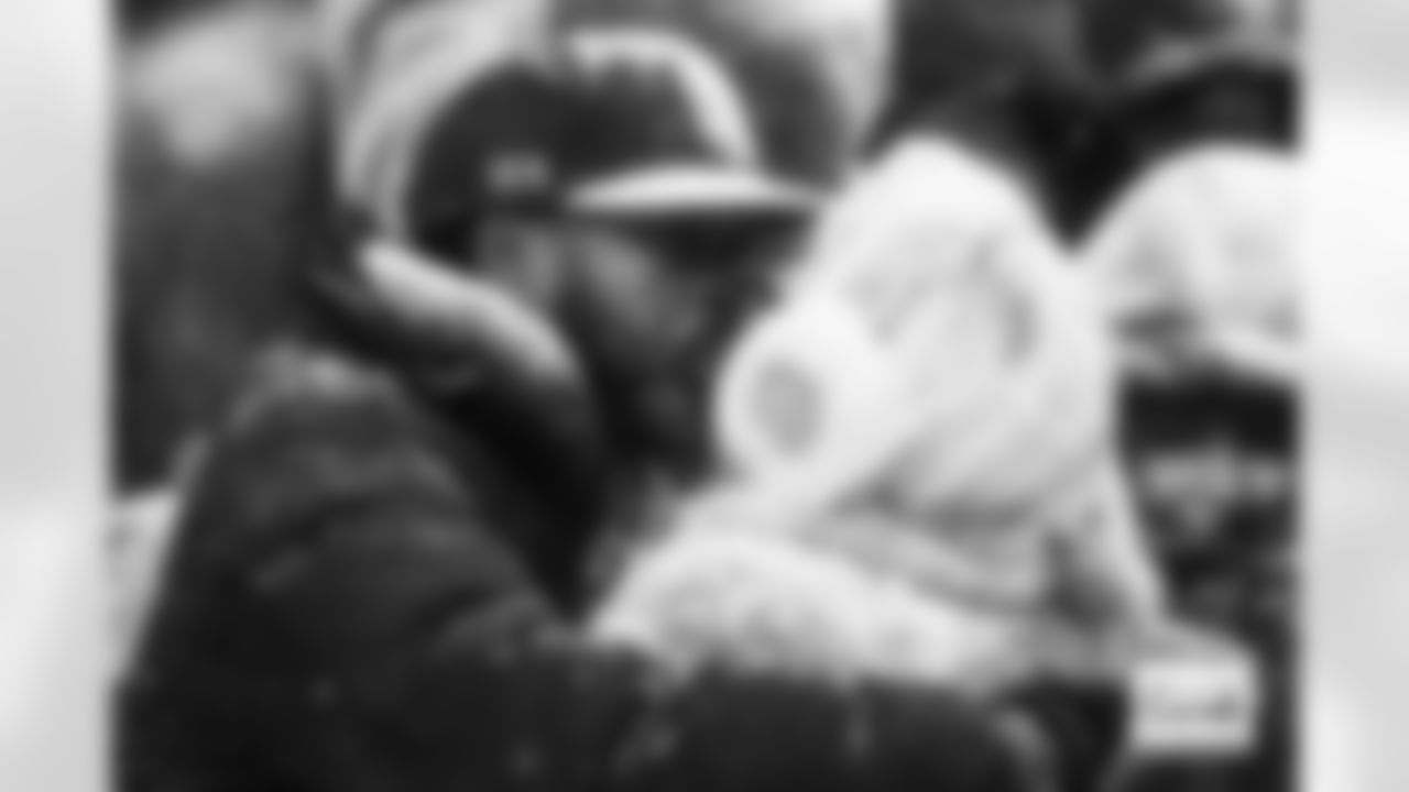 Fans kiss amid the snowfall during the AFC Championship Game between the Denver Broncos and New England Patriots at Empower Field at Mile High in Denver, Colorado on January 25, 2026. Photo by Ben Swanson / Denver Broncos