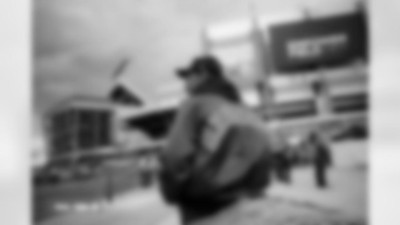 A fan in a retro jacket before the Broncos' Week 8 game against the Dallas Cowboys at Empower Field at Mile High in Denver, Colorado on October 26, 2025. Photo by Ben Swanson / Denver Broncos