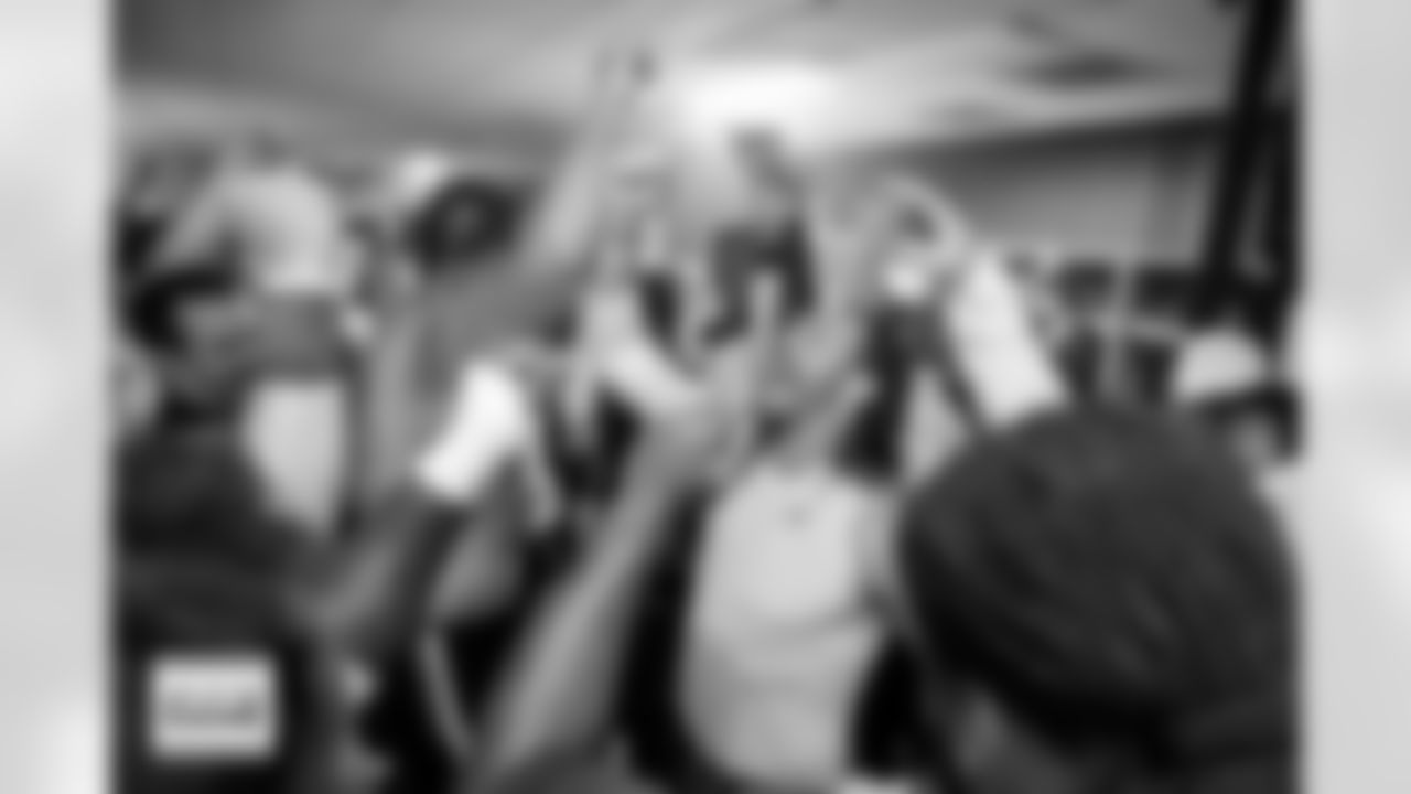 Alex Singleton breaks down the huddle with teammates in the locker room after the Broncos' Week 5 game against the Philadelphia Eagles at Lincoln Financial Field in Philadelphia, Pennsylvania on October 5, 2025. Photo by Gabriel Christus / Denver Broncos