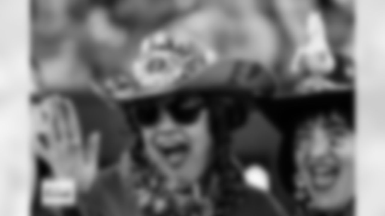 Fans with custom hats before the Broncos' Week 15 game against the Green Bay Packers at Empower Field at Mile High in Denver, Colorado on December 14, 2025. Photo by Ben Swanson / Denver Broncos