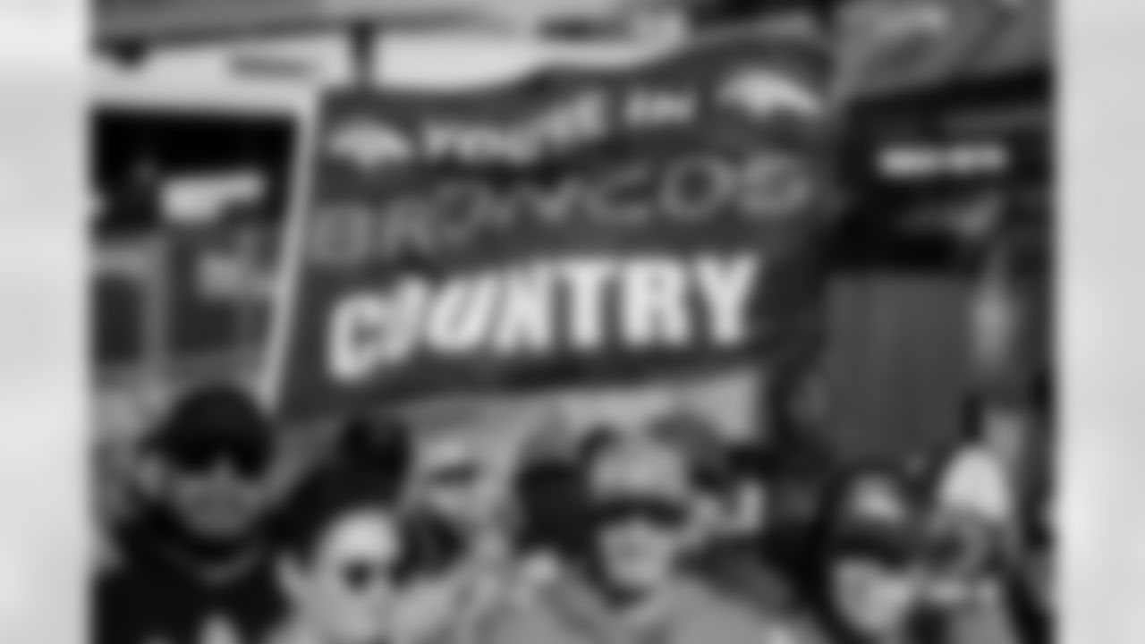 Fans wave a flag before the Broncos' Week 18 game against the Los Angeles Chargers at Empower Field at Mile High in Denver, Colorado on January 4, 2026. Photo by Ben Swanson / Denver Broncos