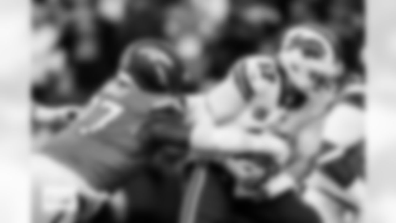 Denver Broncos defensive tackle Malcolm Roach (97) sacks Buffalo Bills quarterback Josh Allen (17) during the Broncos' Divisional Round playoff game against the Buffalo Bills at Empower Field at Mile High in Denver, Colorado on January 17, 2026. Photo by Ben Swanson / Denver Broncos