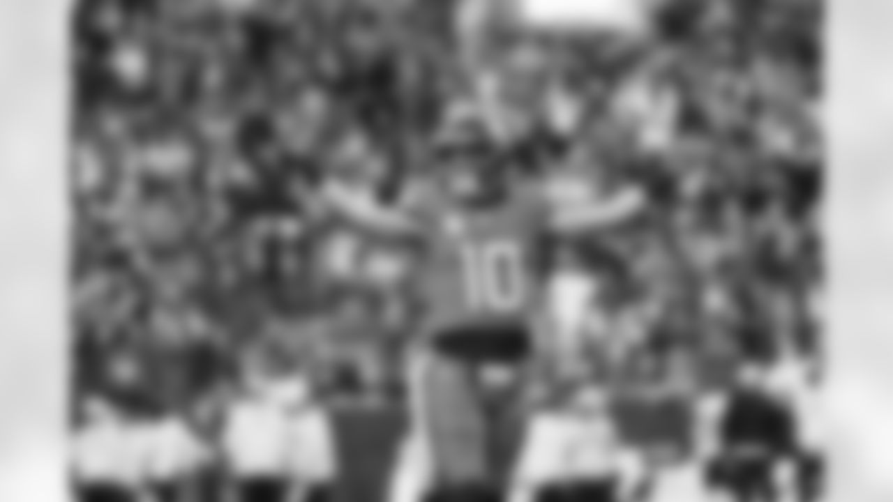 Bo Nix celebrates after a touchdown during the Broncos' Week 11 game against the Atlanta Falcons at Empower Field at Mile High in Denver, Colorado on November 17, 2024. Photo by Rachel O'Driscoll / Denver Broncos