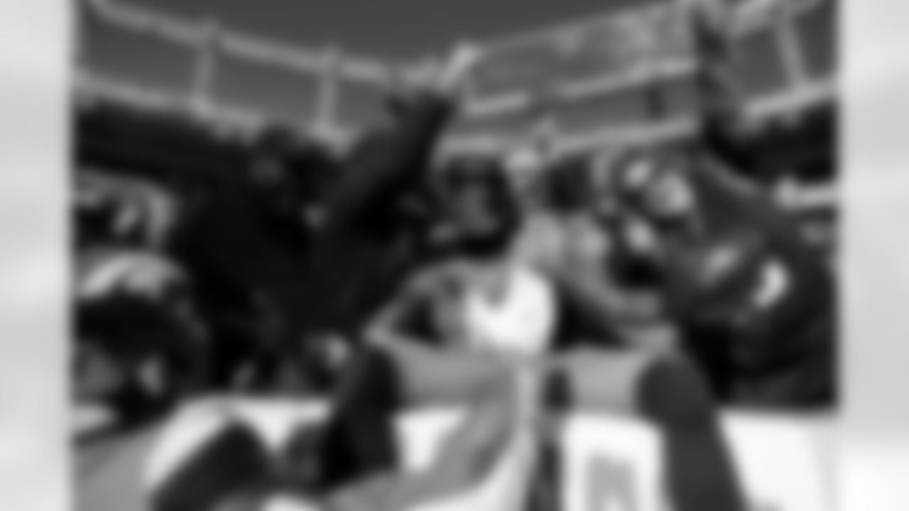 Denver Broncos wide receiver Courtland Sutton (14) celebrates a touchdown in the stands with fans during the Broncos' Week 16 game against the Jacksonville Jaguars at Empower Field at Mile High in Denver, Colorado on December 21, 2025. Photo by Gabriel Christus / Denver Broncos