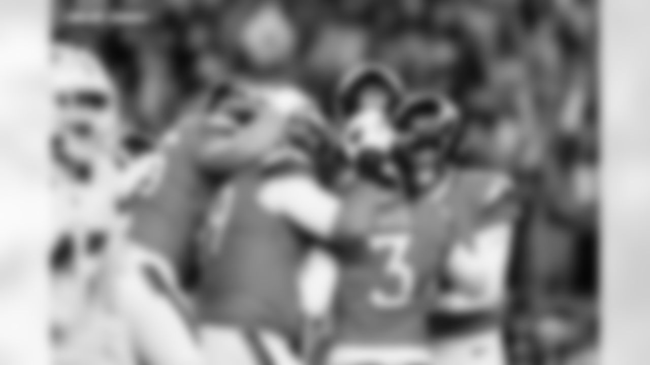 Will Lutz, Mike McGlinchey, Jeremy Crawshaw, Nate Adkins and teammates celebrate the game-winning field goal during the Broncos' Divisional Round playoff game against the Buffalo Bills at Empower Field at Mile High in Denver, Colorado on January 17, 2026. Photo by Ben Swanson / Denver Broncos