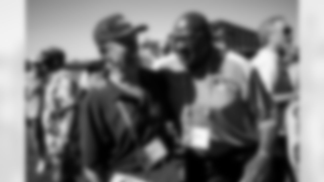 Joe Rizzo and Rubin Carter during an Alumni Weekend visit to practice at Broncos Park Powered by CommonSpirit in Englewood, Colorado on October 5, 2024. Photo by Ben Swanson / Denver Broncos