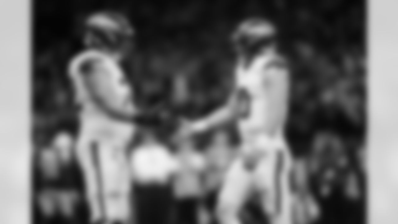 Denver Broncos offensive tackle Garett Bolles (72) and quarterback Bo Nix (10) interact during an NFL football game against the New Orleans Saints on Thursday, October 17, 2024 in New Orleans, Louisiana. (Cooper Neill/NFL)