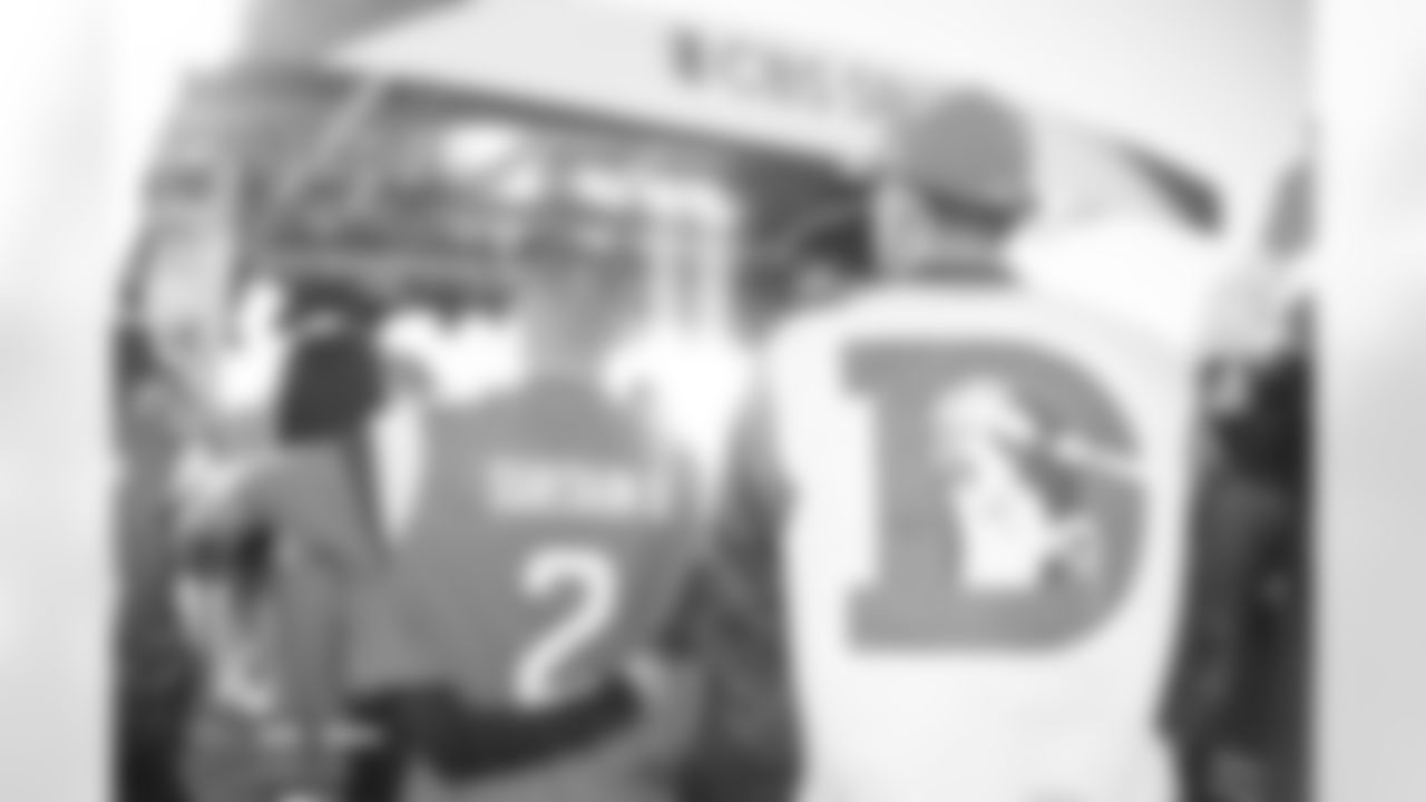 Fans watch the CBS Sports pregame show before the Broncos' Week 11 game against the Kansas City Chiefs at Empower Field at Mile High in Denver, Colorado on November 16, 2025. Photo by Ben Swanson / Denver Broncos