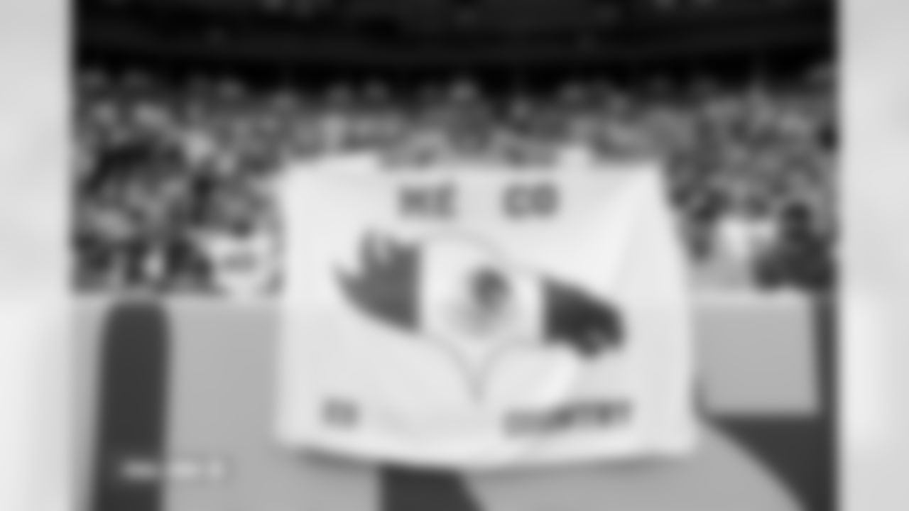 A fan holds a Mexico es Broncos Country banner at halftime during the Broncos' Week 8 game against the Dallas Cowboys at Empower Field at Mile High in Denver, Colorado on October 26, 2025. Photo by Gabriel Christus / Denver Broncos