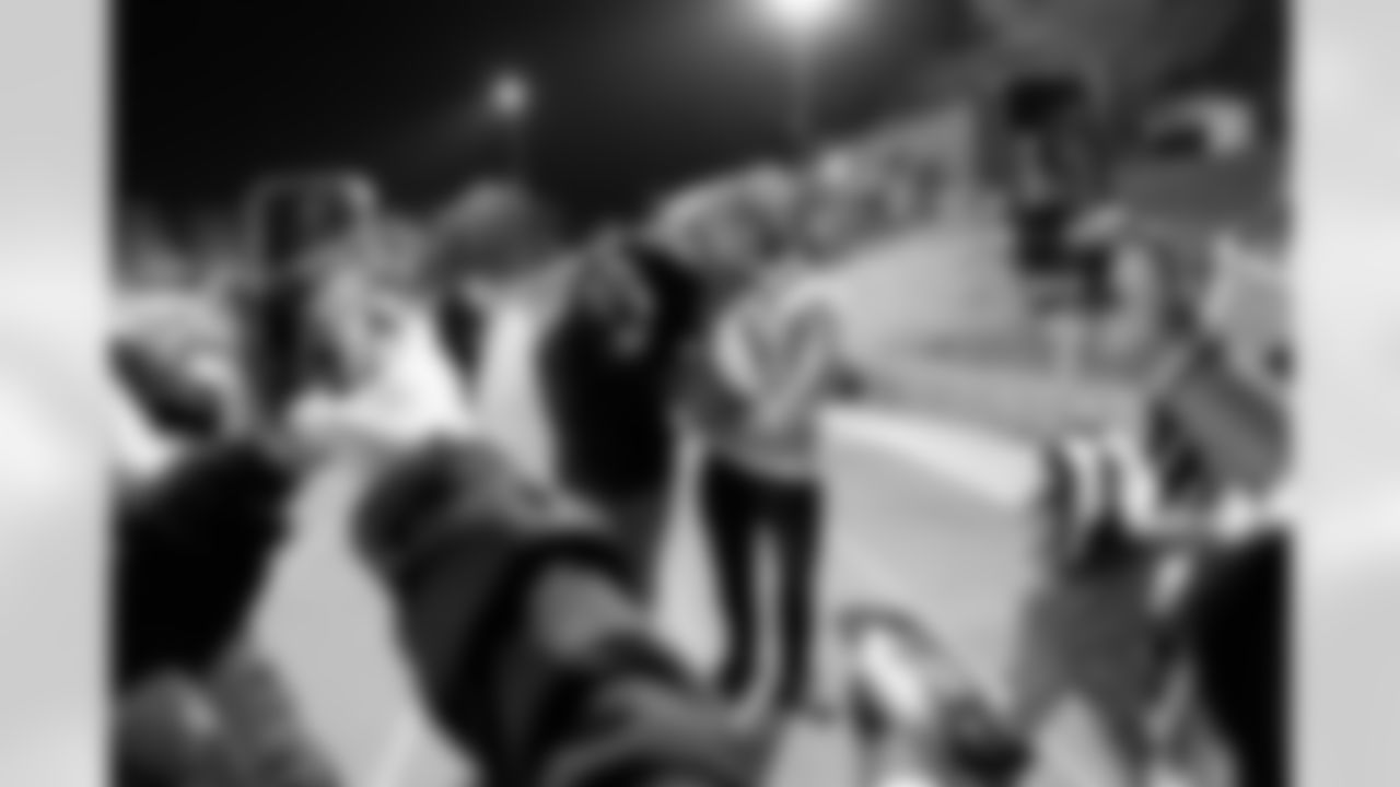 Talanoa Hufanga poses for a photo with Cherry Creek High School students during a visit to watch Cherry Creek play Fountain Fort Carson on Friday, November 14, 2025 at Cherry Creek High School in Greenwood Village, Colorado.
Photo by Gabriel Christus / Denver Broncos