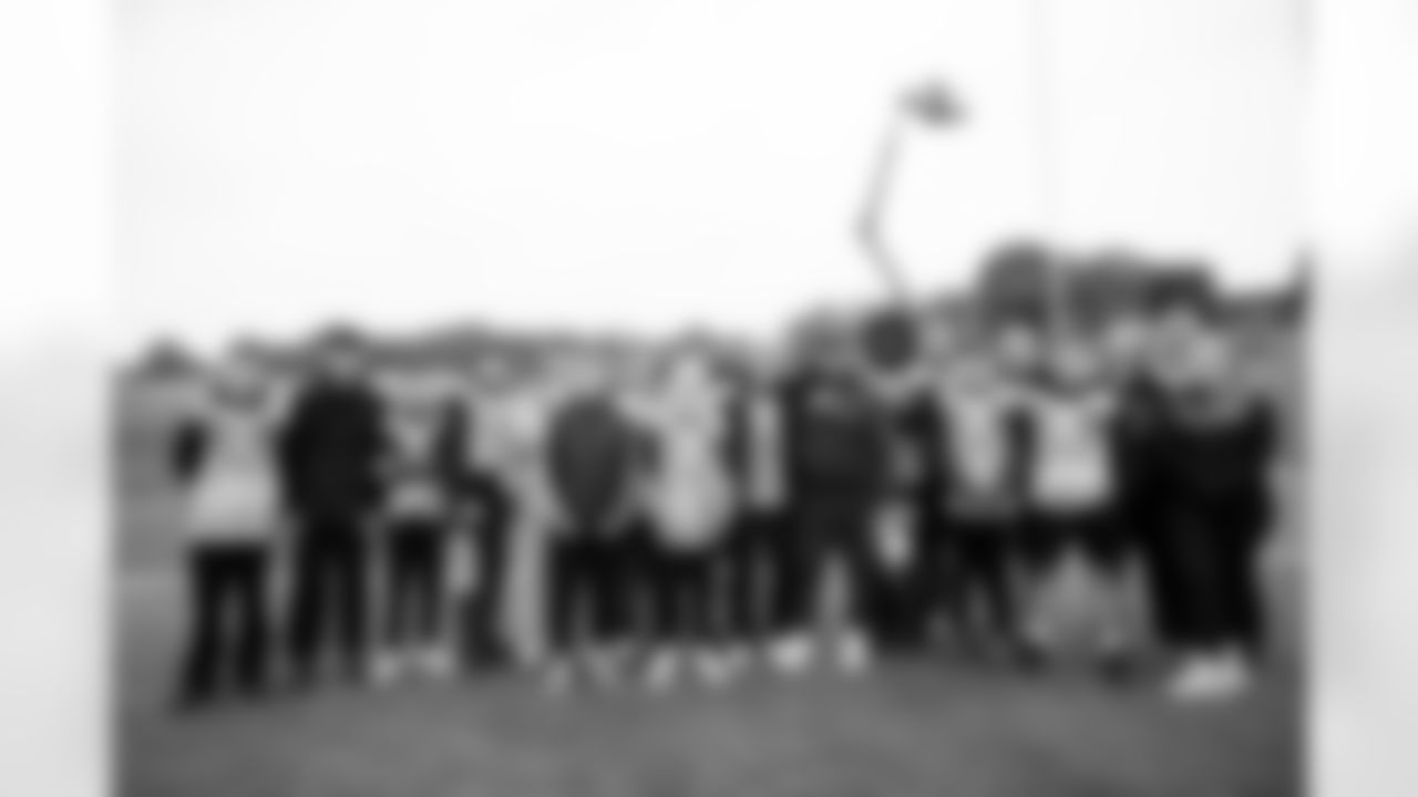 Sean Payton poses with the youth team during the Leicester Panthers' visit to practice in Ware, England on October 10, 2025. Photo by Ben Swanson / Denver Broncos