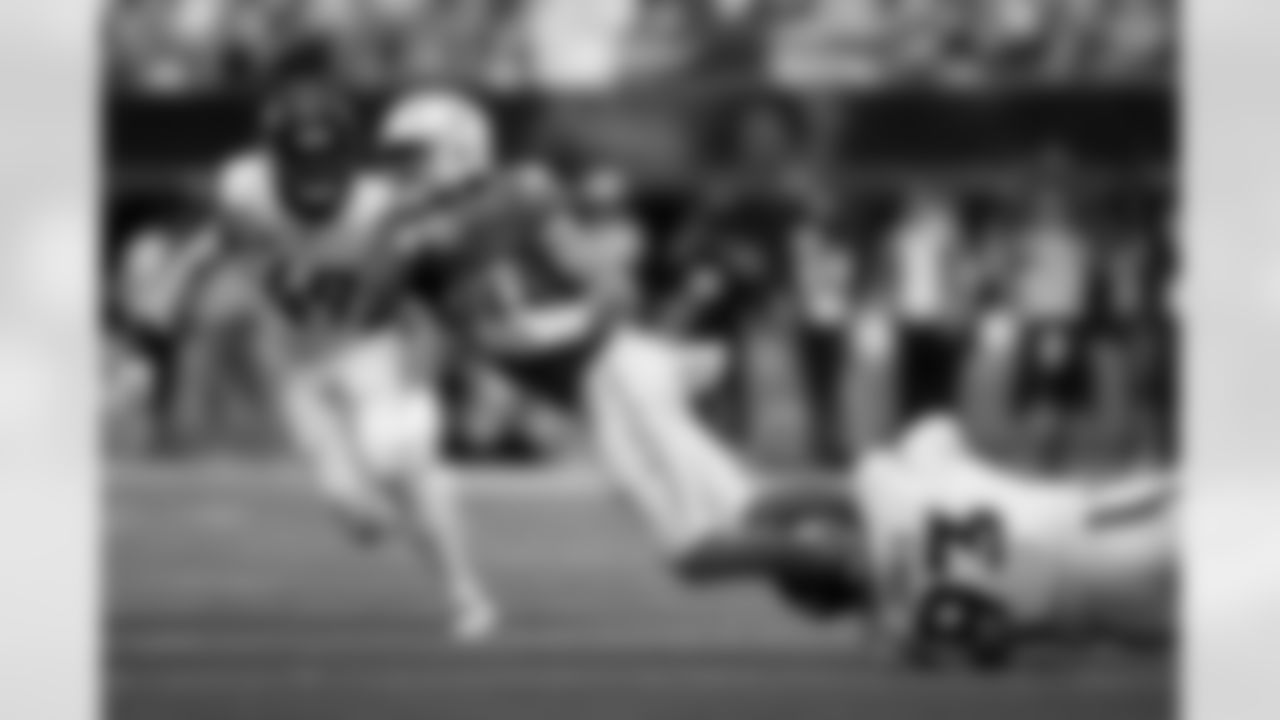 Denver Broncos defensive tackle D.J. Jones (93) sacks Los Angeles Chargers quarterback Justin Herbert (10) during the Broncos' Week 3 game against the Los Angeles Chargers at SoFi Stadium in Inglewood, California on September 21, 2025. Photo by Ben Swanson / Denver Broncos