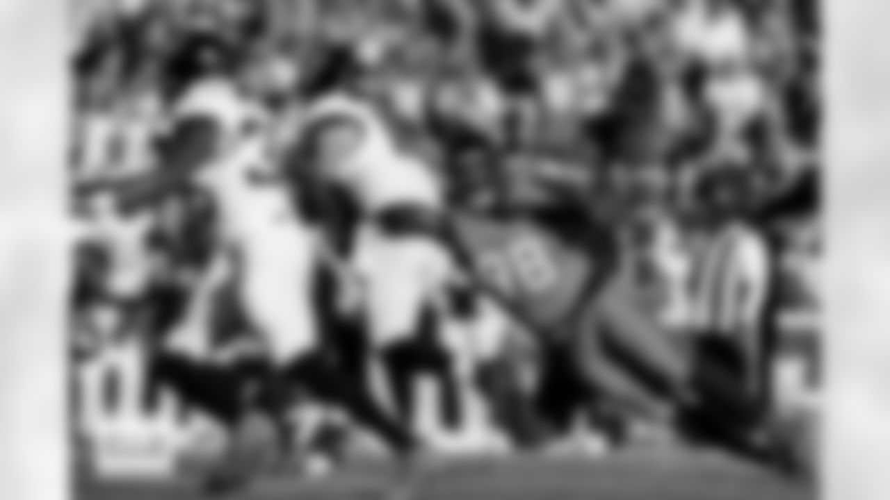 Denver Broncos defensive end John Franklin-Myers (98) sacks Jacksonville Jaguars quarterback Trevor Lawrence (16) during the Broncos' Week 16 game against the Jacksonville Jaguars at Empower Field at Mile High in Denver, Colorado on December 21, 2025. Photo by Ben Swanson / Denver Broncos