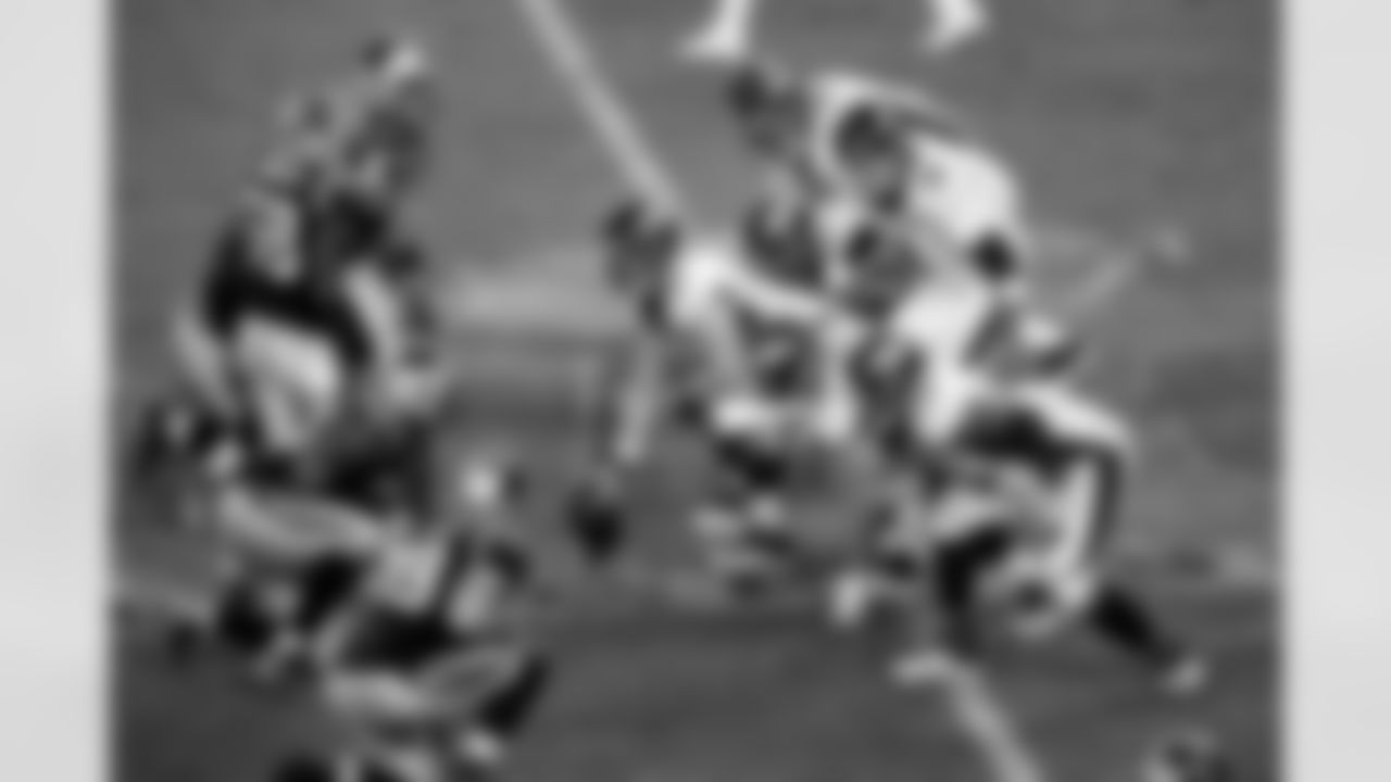 Denver Broncos quarterback Peyton Manning adjusts the formation as the offense gets set prior to a play in the fourth quarter against the Carolina Panthers during the NFL Super Bowl 50 football game on Sunday, Feb. 7, 2016 in Santa Clara, Calif. The Broncos defeated the Panthers, 24-10. (G. Newman Lowrance via AP)