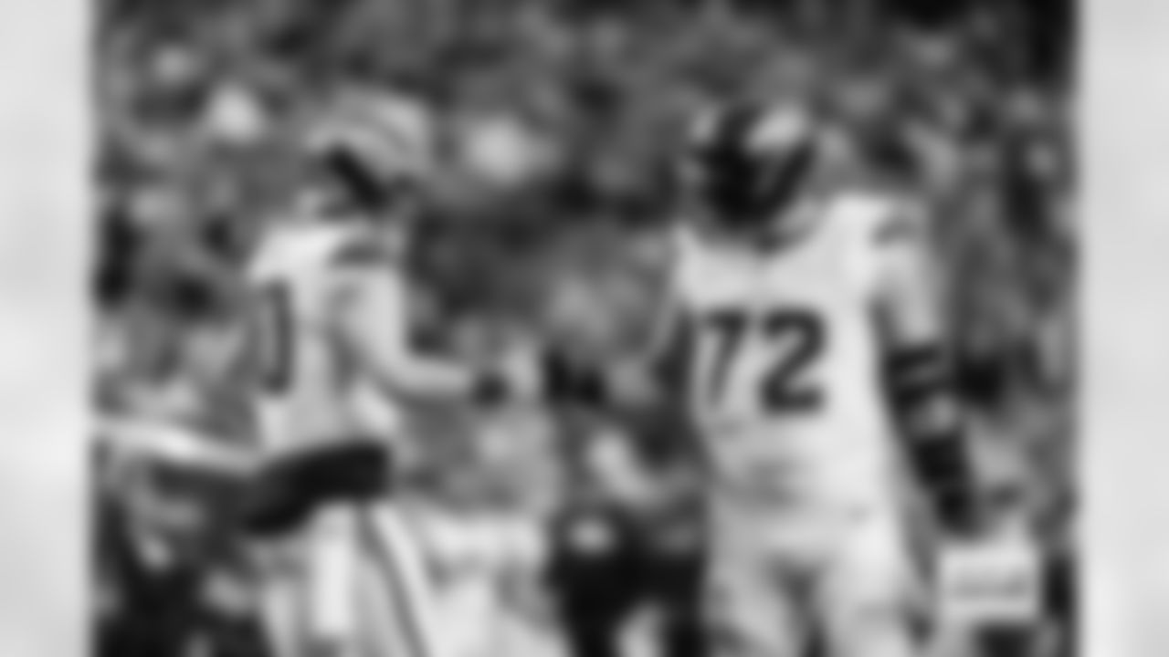 Denver Broncos quarterback Bo Nix (10) fist-bumps offensive tackle Garett Bolles (72) during the Broncos' Week 14 game against the Las Vegas Raiders at Allegiant Stadium in Las Vegas, Nevada on December 7, 2025. Photo by Ben Swanson / Denver Broncos