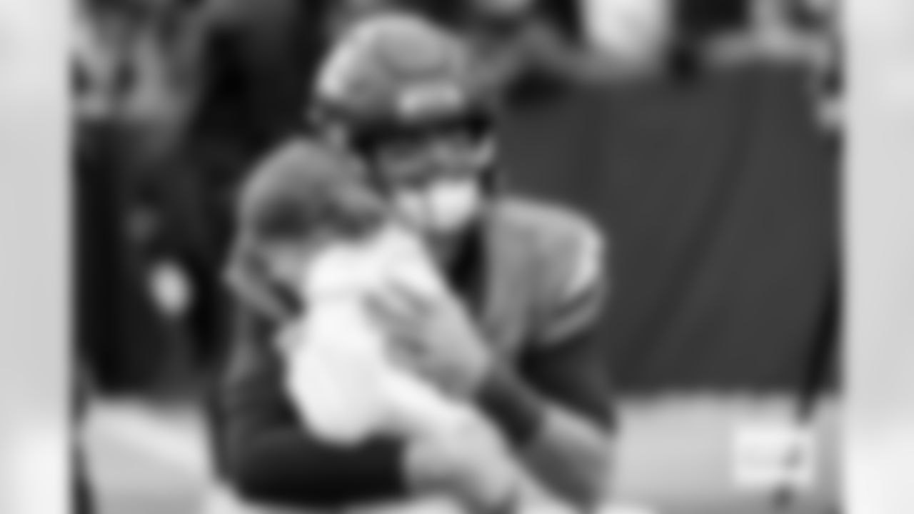 Denver Broncos quarterback Jarrett Stidham (8) hugs his daughter before the AFC Championship Game between the Denver Broncos and New England Patriots at Empower Field at Mile High in Denver, Colorado on January 25, 2026. Photo by Ben Swanson / Denver Broncos