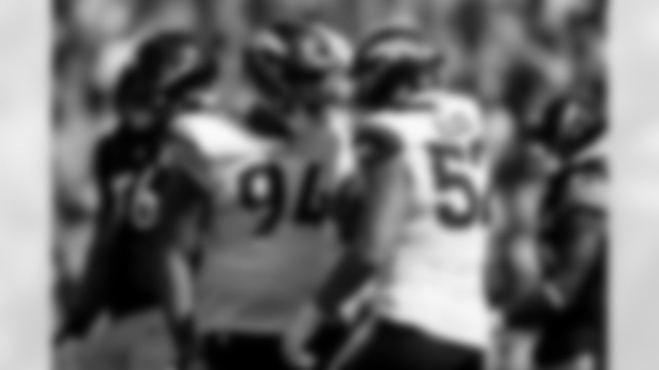 Denver Broncos linebacker Jonah Elliss (52) celebrates with defensive tackle Jordan Jackson (94) after a sack during the Broncos' Week 2 game against the Pittsburgh Steelers at Empower Field at Mile High in Denver, Colorado on September 15, 2024. Photo by Gabriel Christus / Denver Broncos