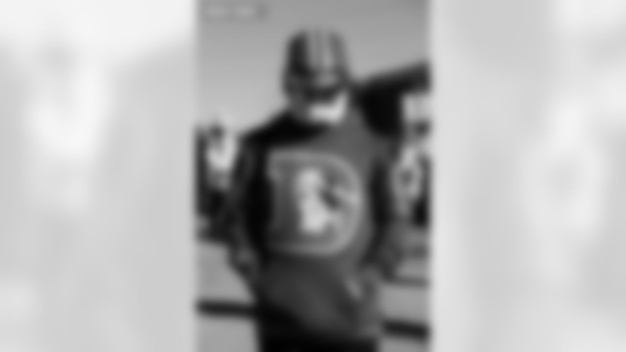 A Denver Broncos fan in a custom iron man helmet before the Broncos' Divisional Round playoff game against the Buffalo Bills at Empower Field at Mile High in Denver, Colorado on January 17, 2026. Photo by Gavin Liddell / Denver Broncos