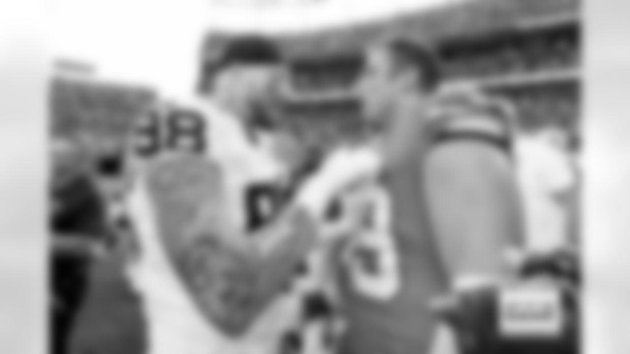Maxx Crosby and Zach Allen after the Broncos' Week 5 game against the Las Vegas Raiders at Empower Field at Mile High in Denver, Colorado on October 6, 2024. Photo by Gabriel Christus / Denver Broncos