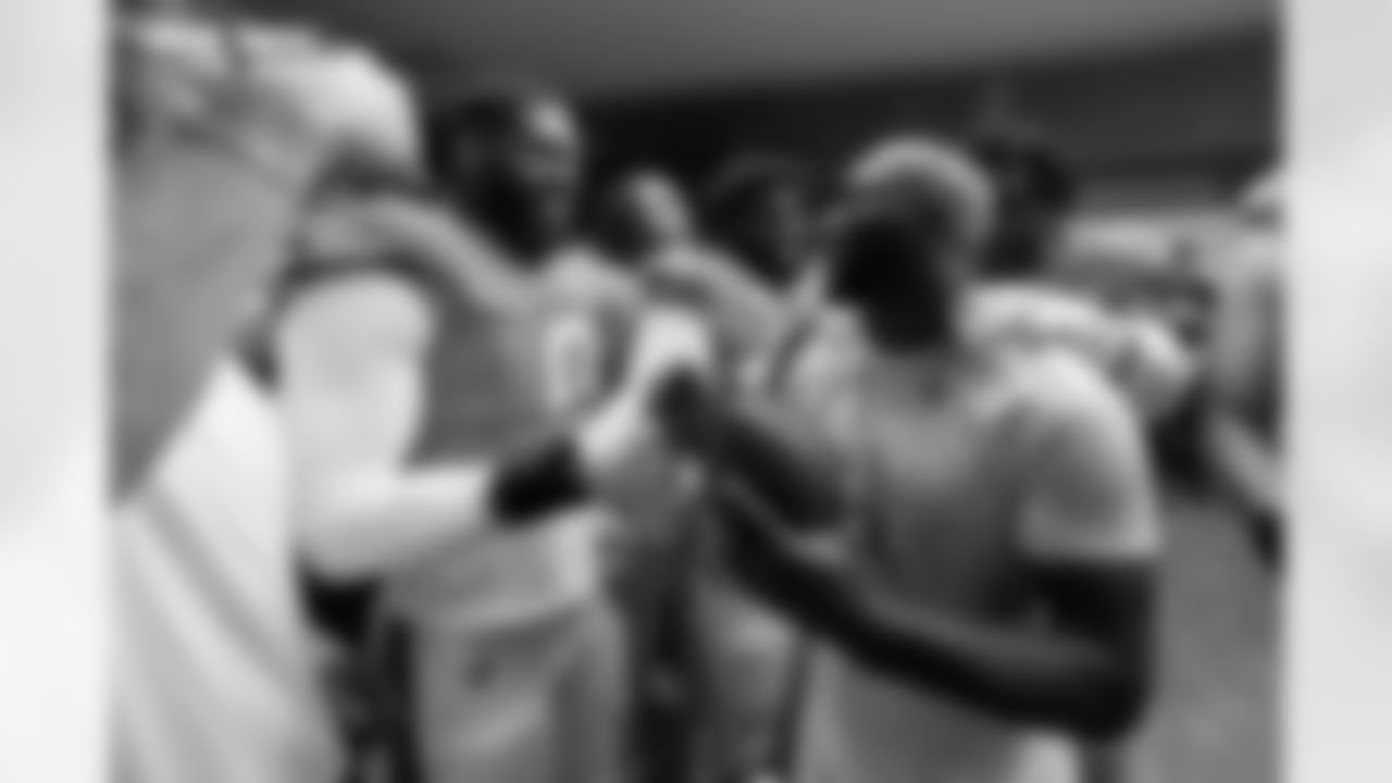 Jonathon Cooper and Ja'Quan McMillian during the Broncos' Divisional Round playoff game against the Buffalo Bills at Empower Field at Mile High in Denver, Colorado on January 17, 2026. Photo by Gabriel Christus / Denver Broncos