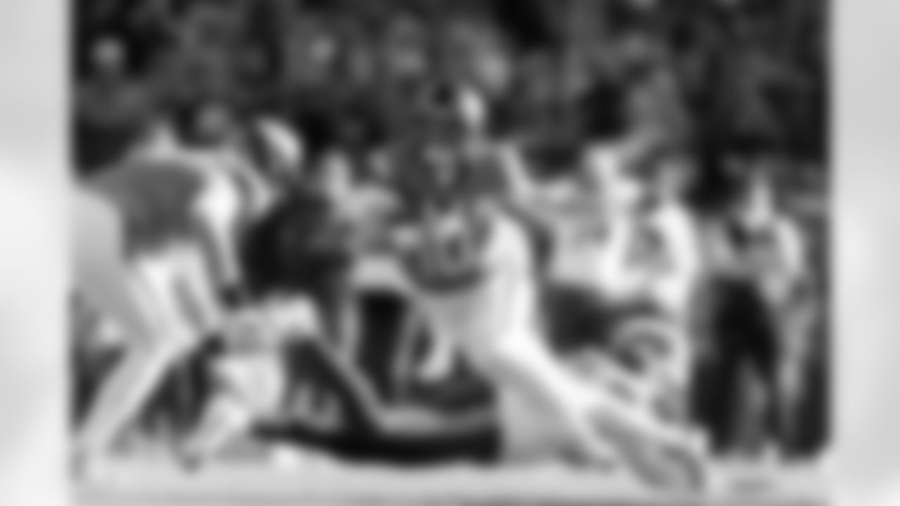 Denver Broncos quarterback Bo Nix (10) runs with the ball during the Broncos' Divisional Round playoff game against the Buffalo Bills at Empower Field at Mile High in Denver, Colorado on January 17, 2026. Photo by Gabriel Christus / Denver Broncos