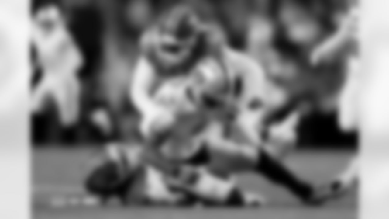 Jonathon Cooper and Nik Bonitto during the Broncos' Week 10 game against the Las Vegas Raiders at Empower Field at Mile High in Denver, Colorado on November 6, 2025. Photo by Ben Swanson / Denver Broncos