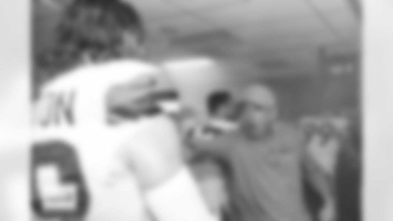 Denver Broncos linebacker Alex Singleton (49) celebrates with Sean Payton in the locker room after the Broncos' Week 5 game against the Philadelphia Eagles at Lincoln Financial Field in Philadelphia, Pennsylvania on October 5, 2025. Photo by Gabriel Christus / Denver Broncos