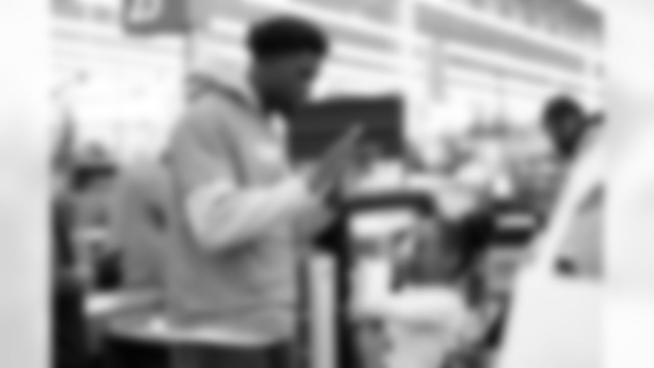 Children from the Denver Broncos Boys & Girls Club participate in a Shop with a Jock shopping spree with Broncos players, alumni and cheerleader alumni in Aurora, Colorado on December 2, 2025. Photo by Ben Swanson / Denver Broncos